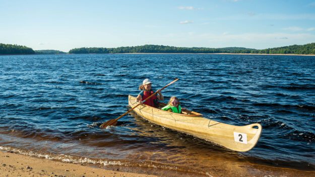 Betsy and Sylive paddling on the raquette river at carry falls reservoir