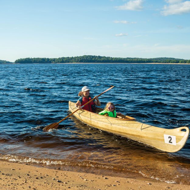Betsy and Sylive paddling on the raquette river at carry falls reservoir